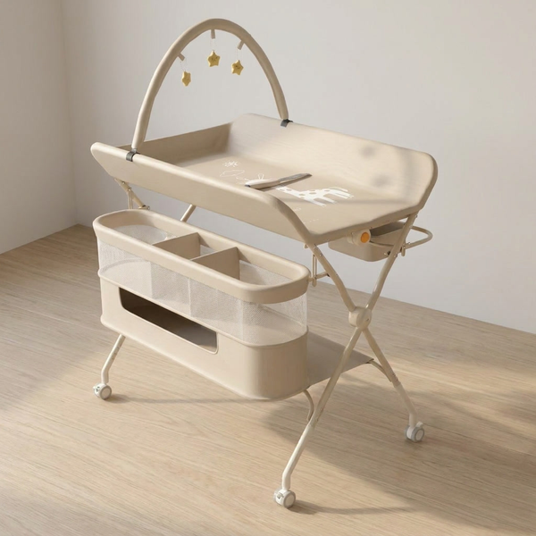 Table à langer pliable Langéo avec arche d'éveil